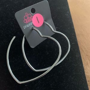 Silver heart shaped earrings